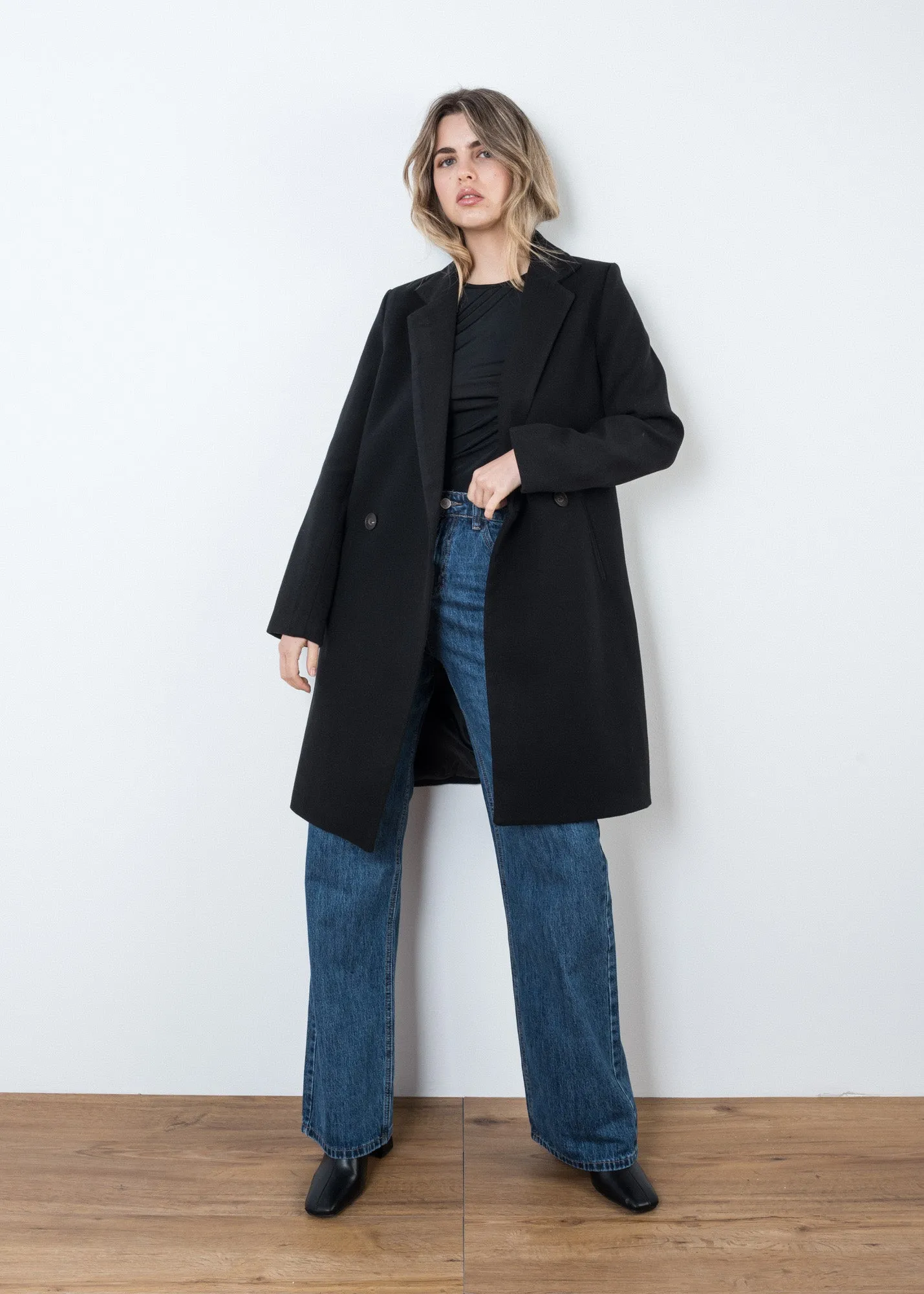 Cappotto doppiopetto con revers